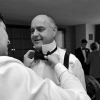 Groom Finishes Bowtie Knot - Father of the Bride, Getting Ready