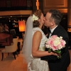 Bride and Groom Kiss in Lobby after First Look in Carlton Hotel Lobby