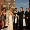 Bride looks out at Guests during Rooftop Ceremony