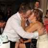 Alex and Toni Kissing after their Cake Cutting