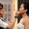 Bride's lipstick being applied
