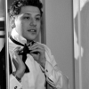 Groom ties his bowtie in the Mirror - Getting Ready, Millenium Hotel